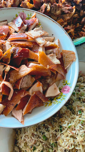 Warung Nasi Babi Guling Men Repot