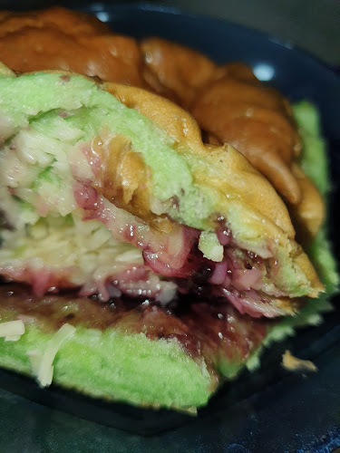 parkiran menara alfa omega, Jl. Raya Tomohon No.72, Paslaten Satu, Kec. Tomohon Tim., Kota Tomohon, Sulawesi Utara