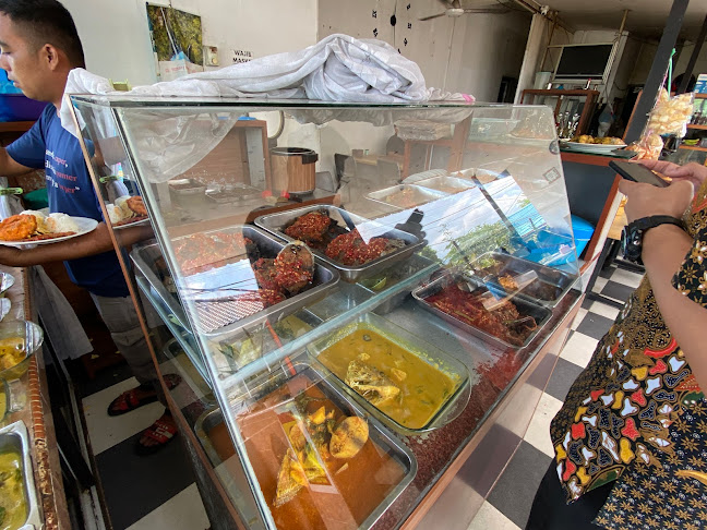 Opinii despre Koto Tinggi în Kota Batam - Gastronomi dan perhotelan