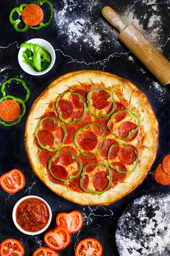 Opinii despre Miglio Pizza & Bakery în Surabaya - Gastronomi dan perhotelan