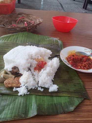Opinii despre Nasi bungkus daun ( GM ) gonjong merah Depan SMA 5 Bukittinggi în Kota Bukittinggi - Gastronomi dan perhotelan