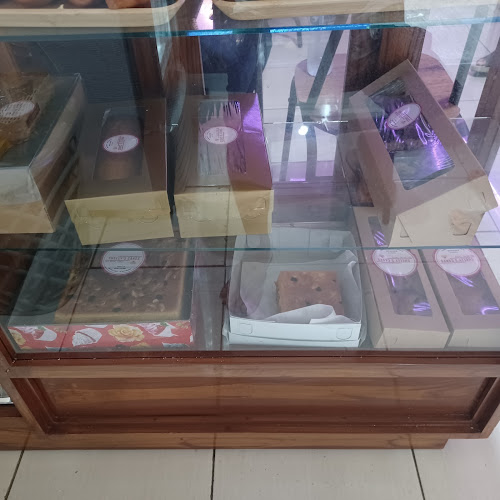 FRCQ+5Q6, Jl. Sam Ratulangi, Tj. Batu, Kec. Wanea, Kota Manado, Sulawesi Utara